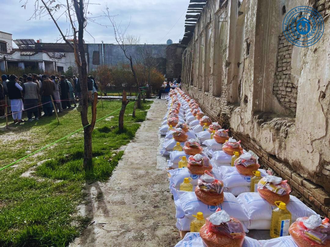 Afghan community members receiving assistance